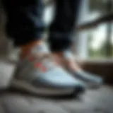 Sleek design of Adidas Boost shoes highlighting comfort and style