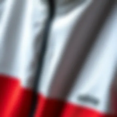 Quality Fabric Construction Close-up of high-quality fabric used in Adidas tracksuits