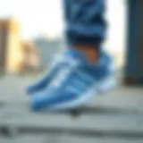 Stylish Adidas Nizza shoes showcasing blue stripes