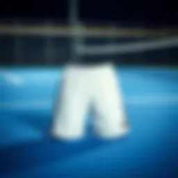 Elegant design of Adidas tennis shorts placed on a tennis court