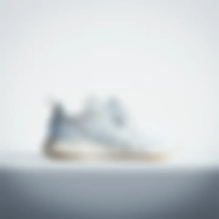 Elegant Adidas Footwear Design Sleek design of Adidas white sports shoes on a minimalist background