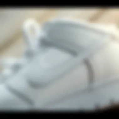 Close-up view of White Nike Dunk showcasing its intricate design