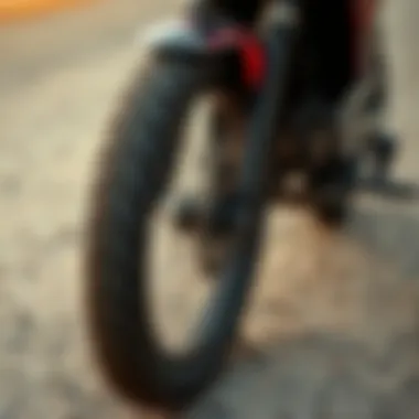 A close-up view of drift bike tires on a rugged surface