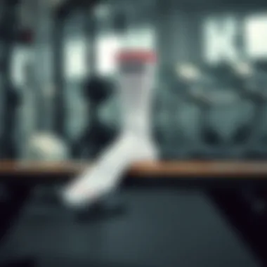 Stylish white sports socks on a gym bench