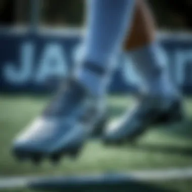 Athlete maintaining Joma cleats, emphasizing care and maintenance tips