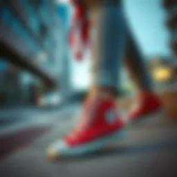A stylish woman showcasing red Converse shoes in an urban setting