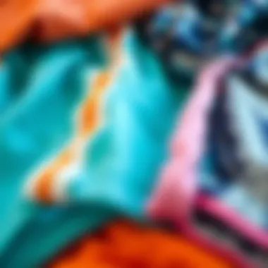 A selection of fabrics used in girl's swimwear, highlighting texture and quality.