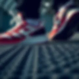 A close-up view of athletic shoes showcasing the unique traction pattern.