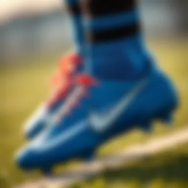 Close-up of Nike blue socked football boots highlighting design details