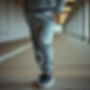 Nike grey sweatpants paired with sporty accessories