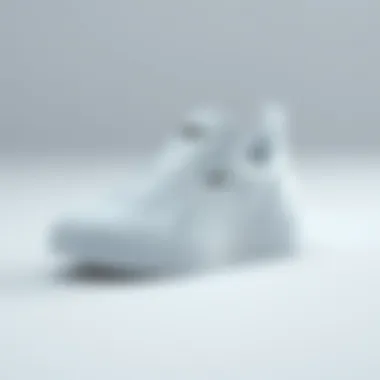 Stylish Puma white sneakers on a minimalist background