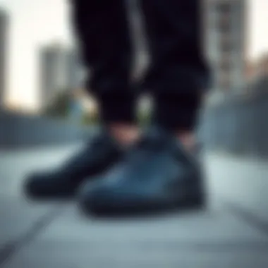 Black Air Force Sneakers in Urban Setting Aesthetic view of black Air Force sneakers in an urban setting