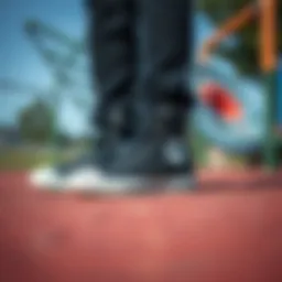 Stylish black children's Converse shoes on a playground